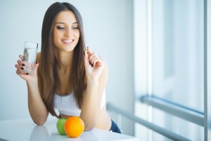 Portrait of young woman with perfect skin clean